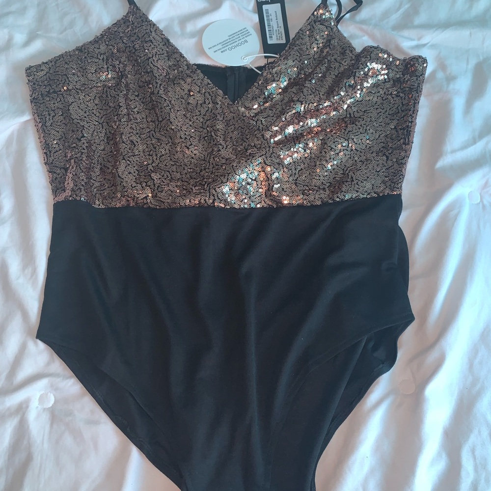 Brand new sequin top bodysuit with zippered back.  Gorgeous!